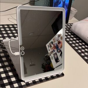 Sleek White Electronic Device Stand